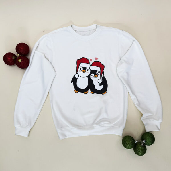 Buzo navideño pareja de pinguinos